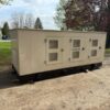 135 KW gas generator front enclosure with access doors shut