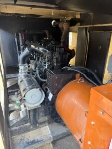 Hino Generator with muffler beside